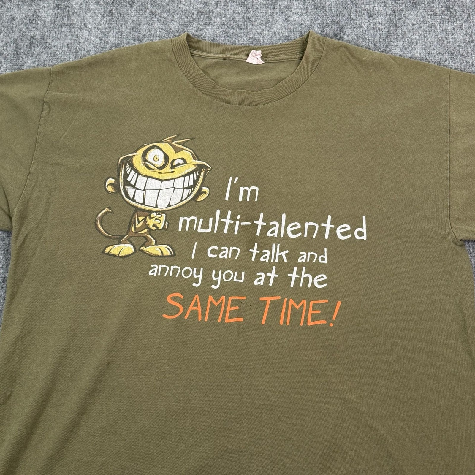 Vintage Y2K Stars Apparel & Action Multi-Talented Graphic T-Shirt Olive