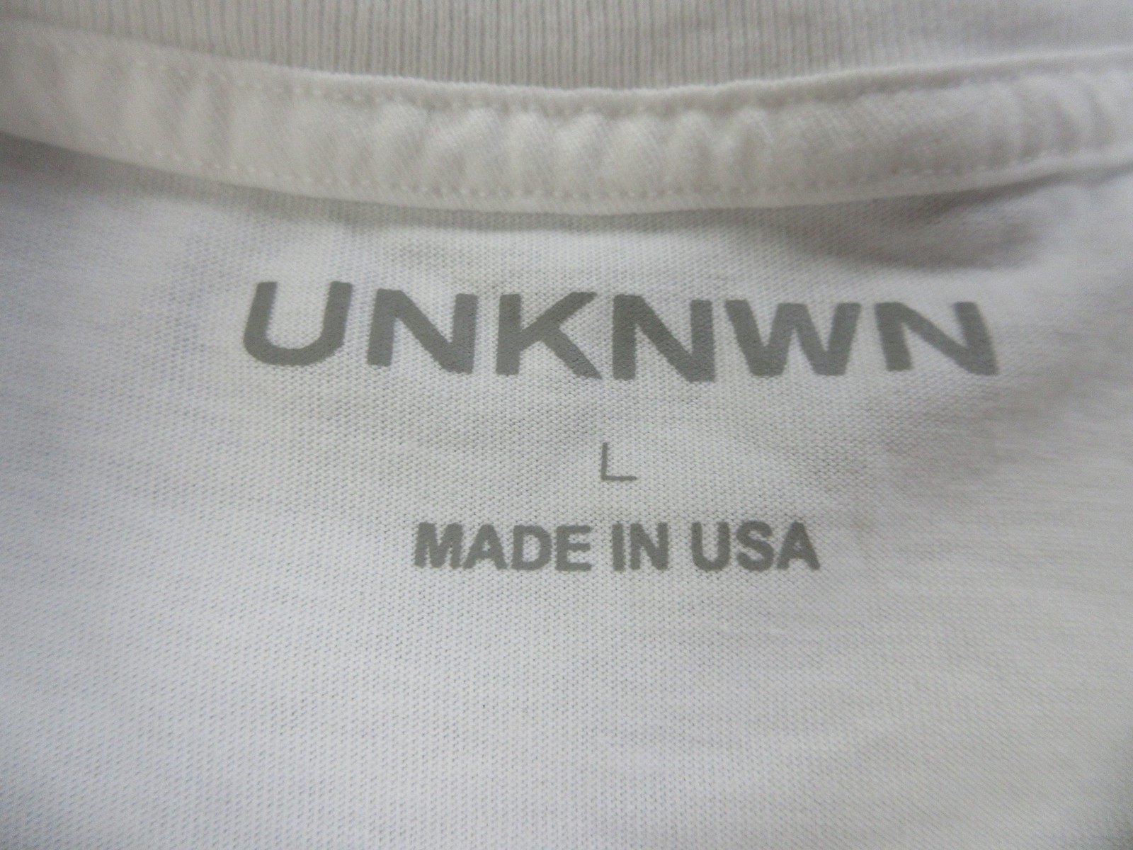 UNKNWN Shirt Mens Large White Smile Graphic Tee The Fight To Get There USA
