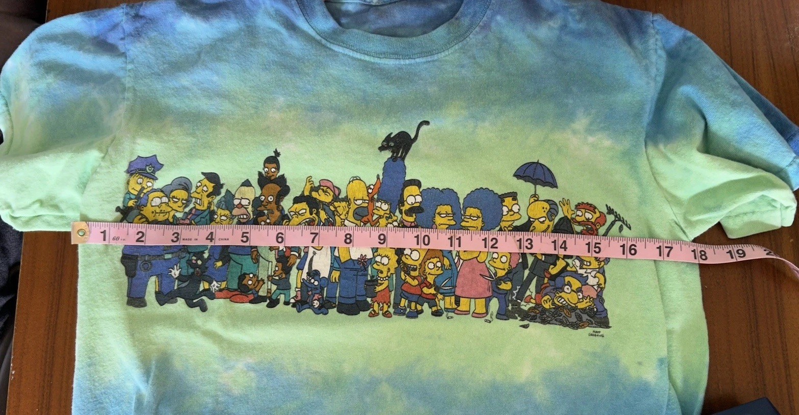 The Simpson’s Tie Dye Blue Green Graphic Tshirt Size Unknown See Measurements