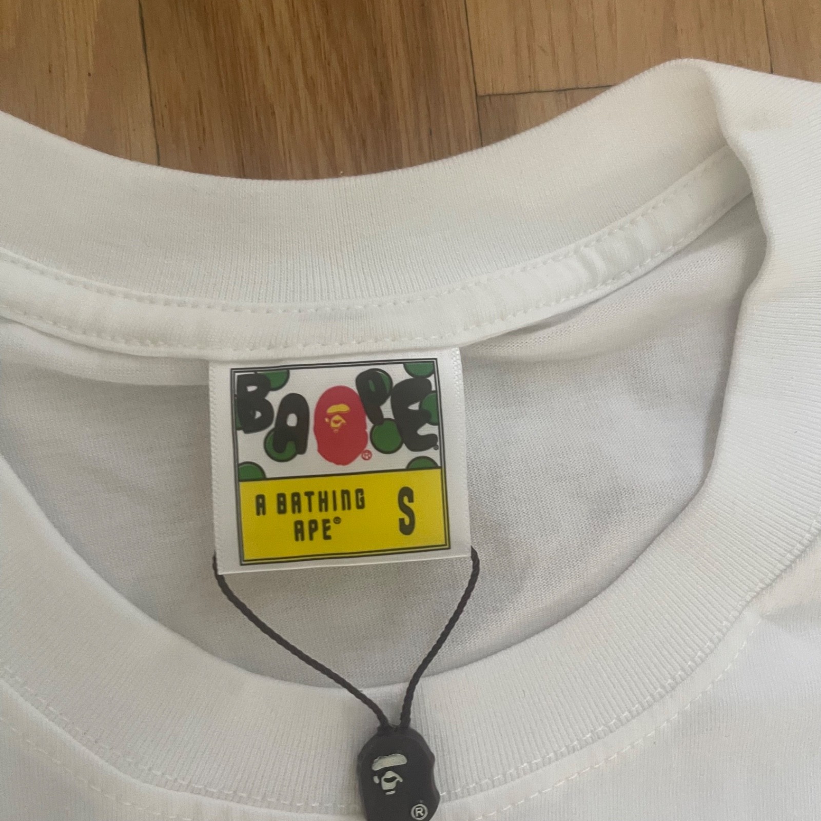 A Bathing Ape BAPE Men’s Small White Short Sleeve Crew Neck Ape Head Logo Tee