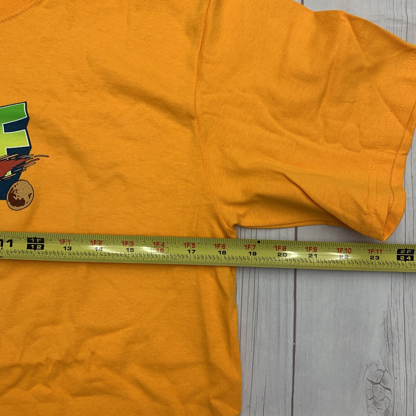 Huf world yellow gold T-shirt unisex size M