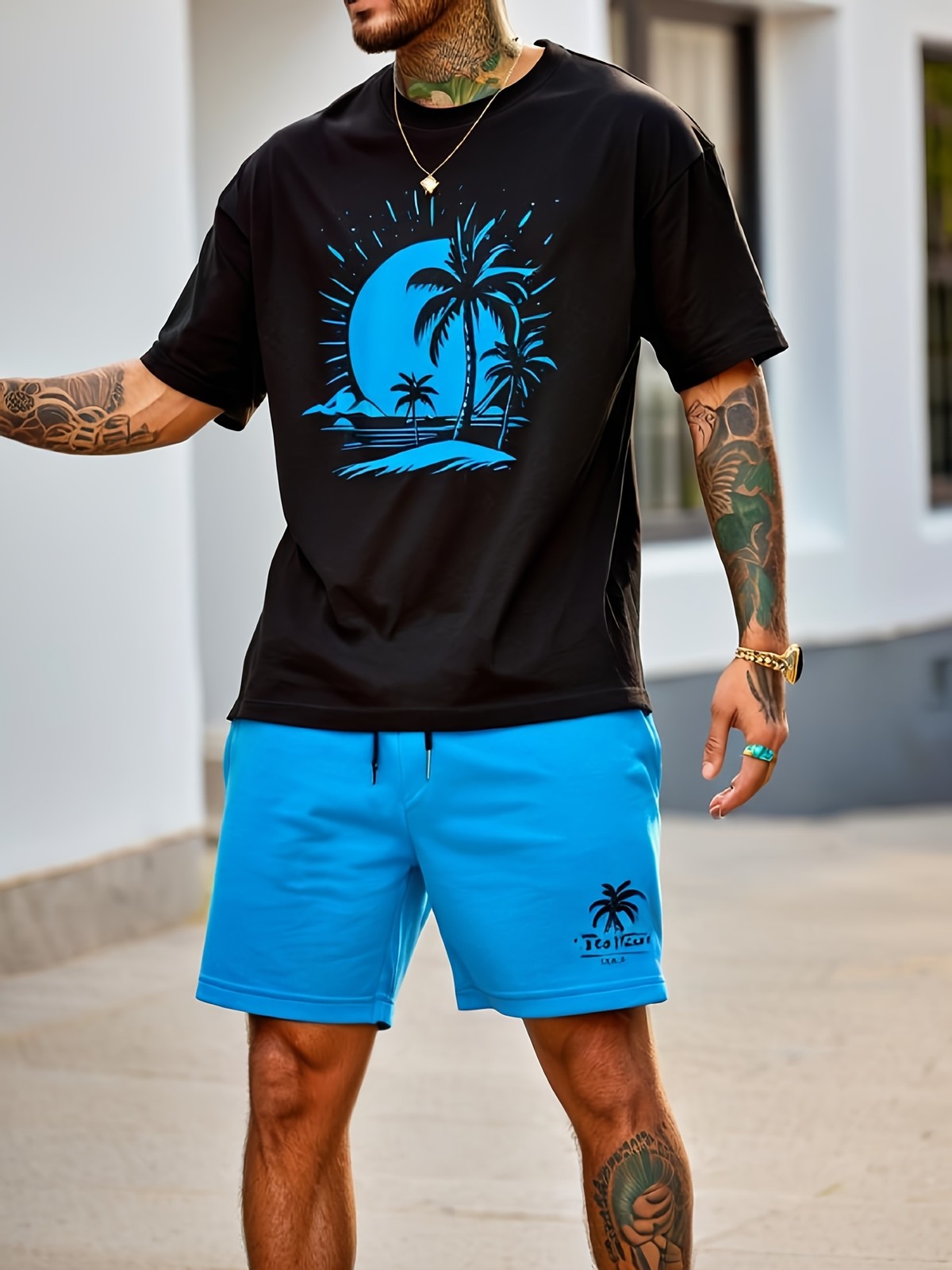 Tropical Palms Sunset Graphic Tee – Minimalist Blue Coastal Streetwear Shirt
