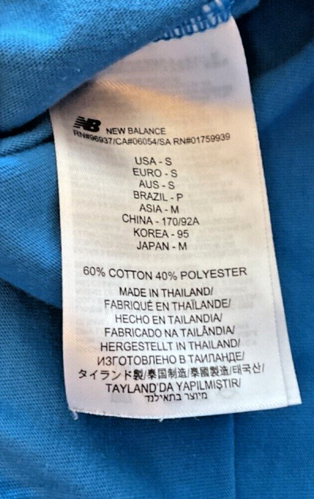 NB New Balance Stretch Blue Pocket T Shirt Unisex size Small Round Slit Hemline