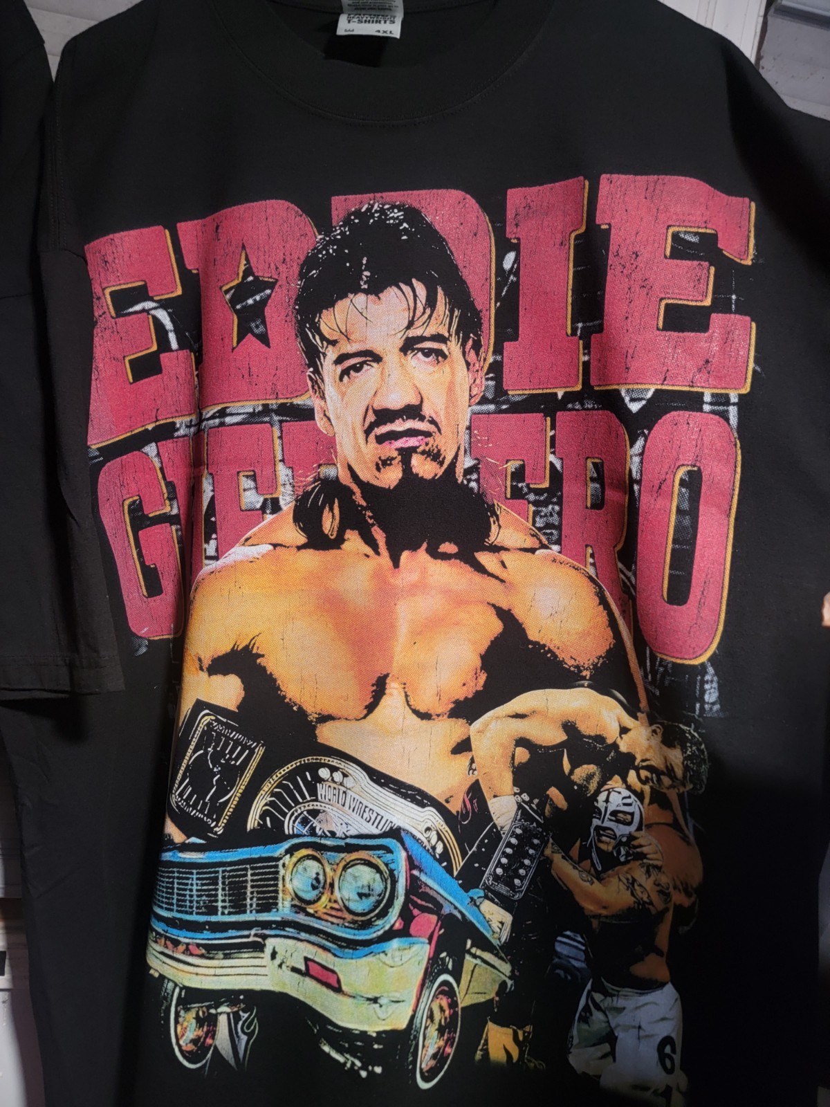 EDDIE GUERRERO LATINO HEAT ON A SHAKA HEAVYWEIGHT GARMET DYED T SHIRT “MODERN”