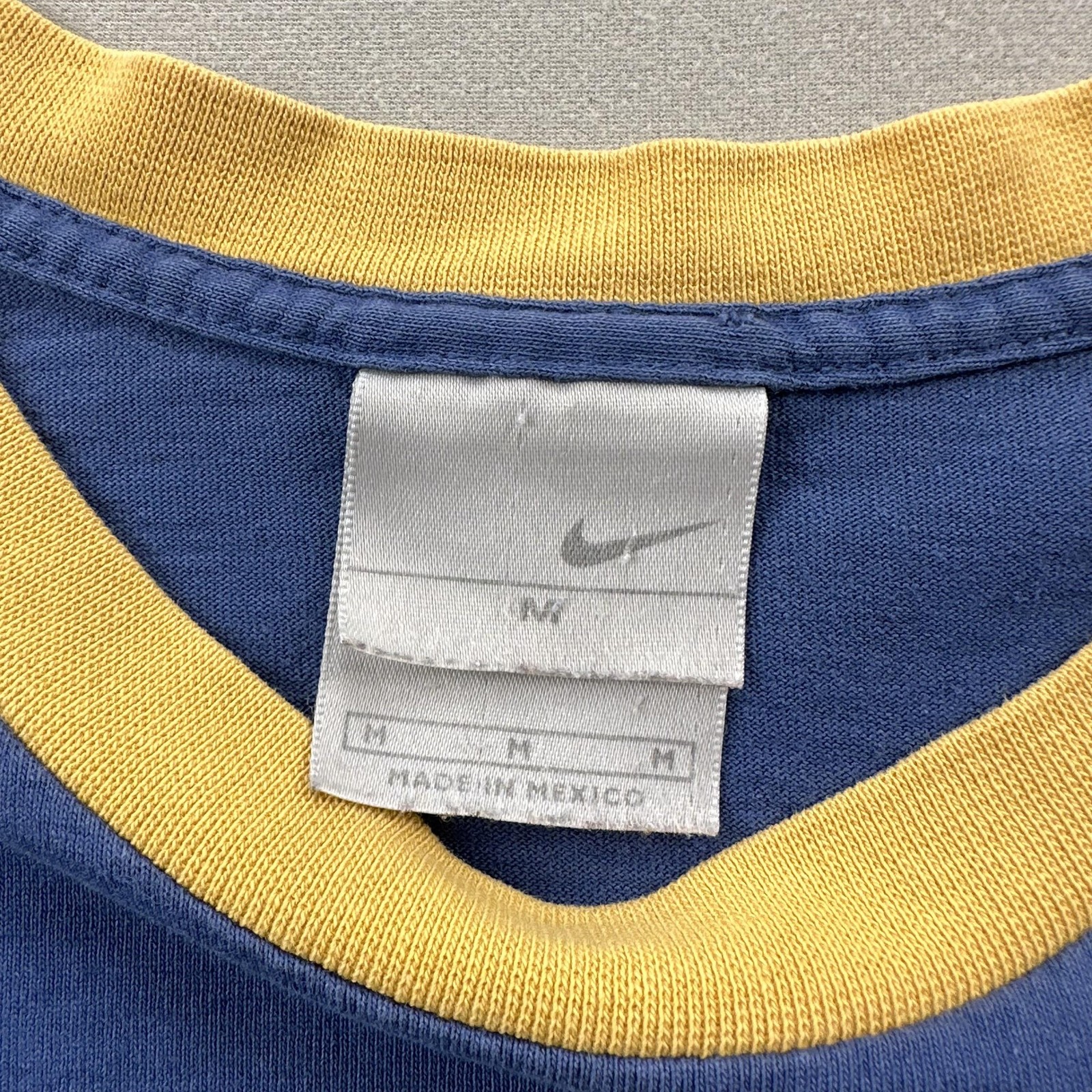 Vintage Nike T-Shirt Mens Medium Blue Yellow Swoosh Spell Out Long Sleeve y2k