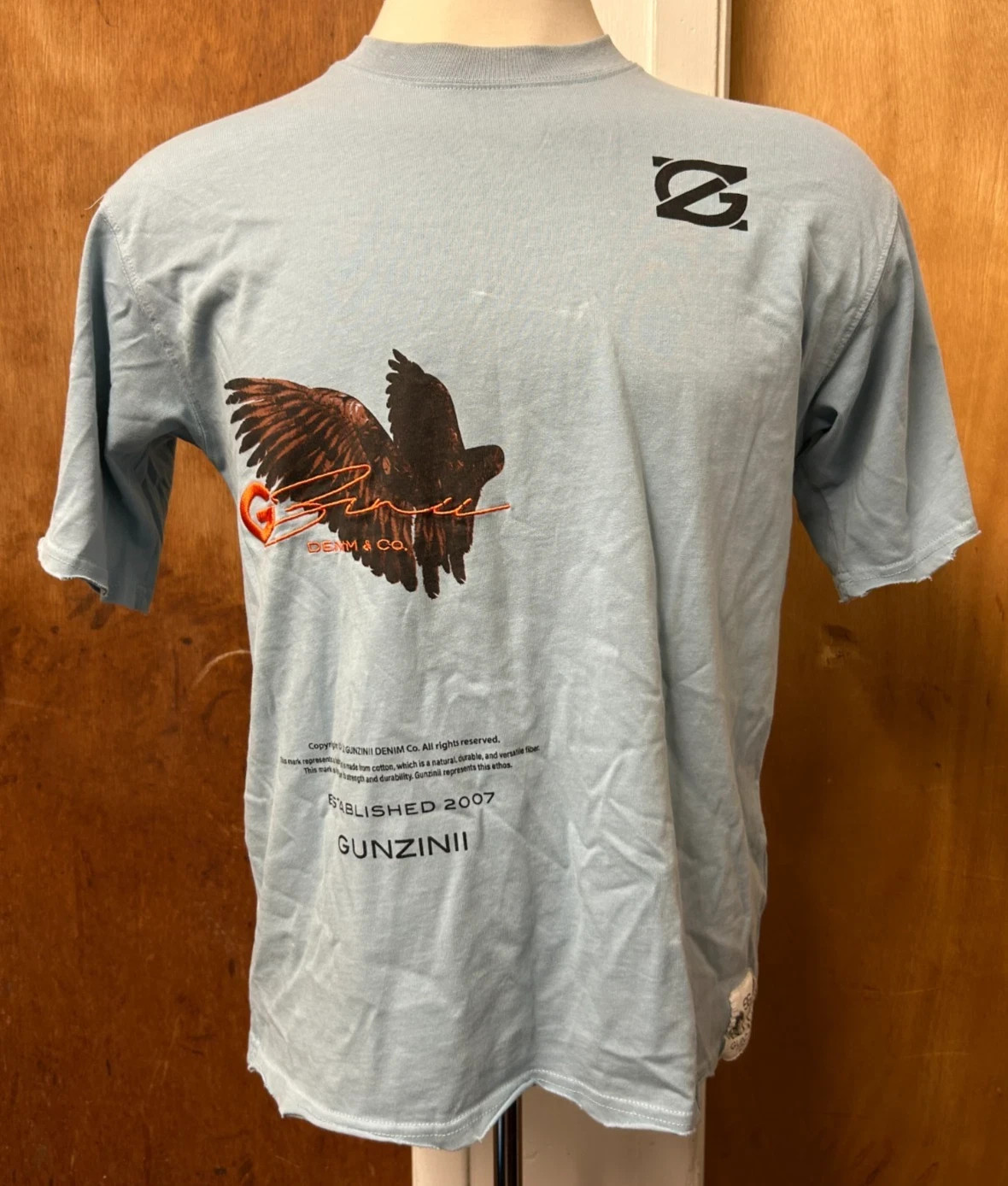 Gunzinii Men’s US Size S Light Blue Graphic Spell Out T-Shirt