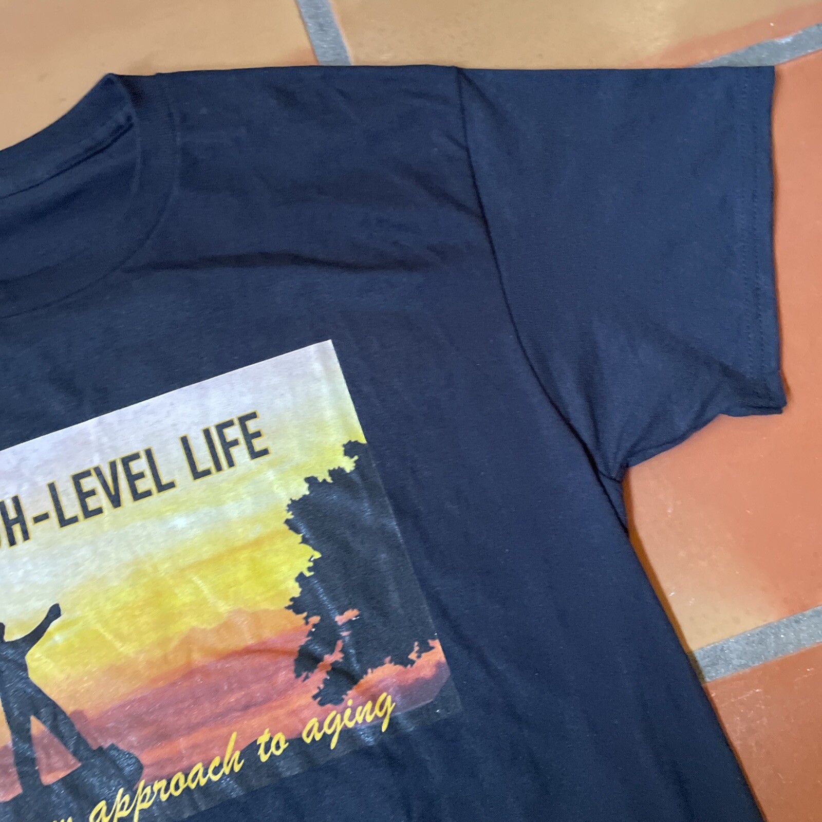 Vintage Black Graphic Print T-Shirt High Level Life A New Approach To Aging Tee