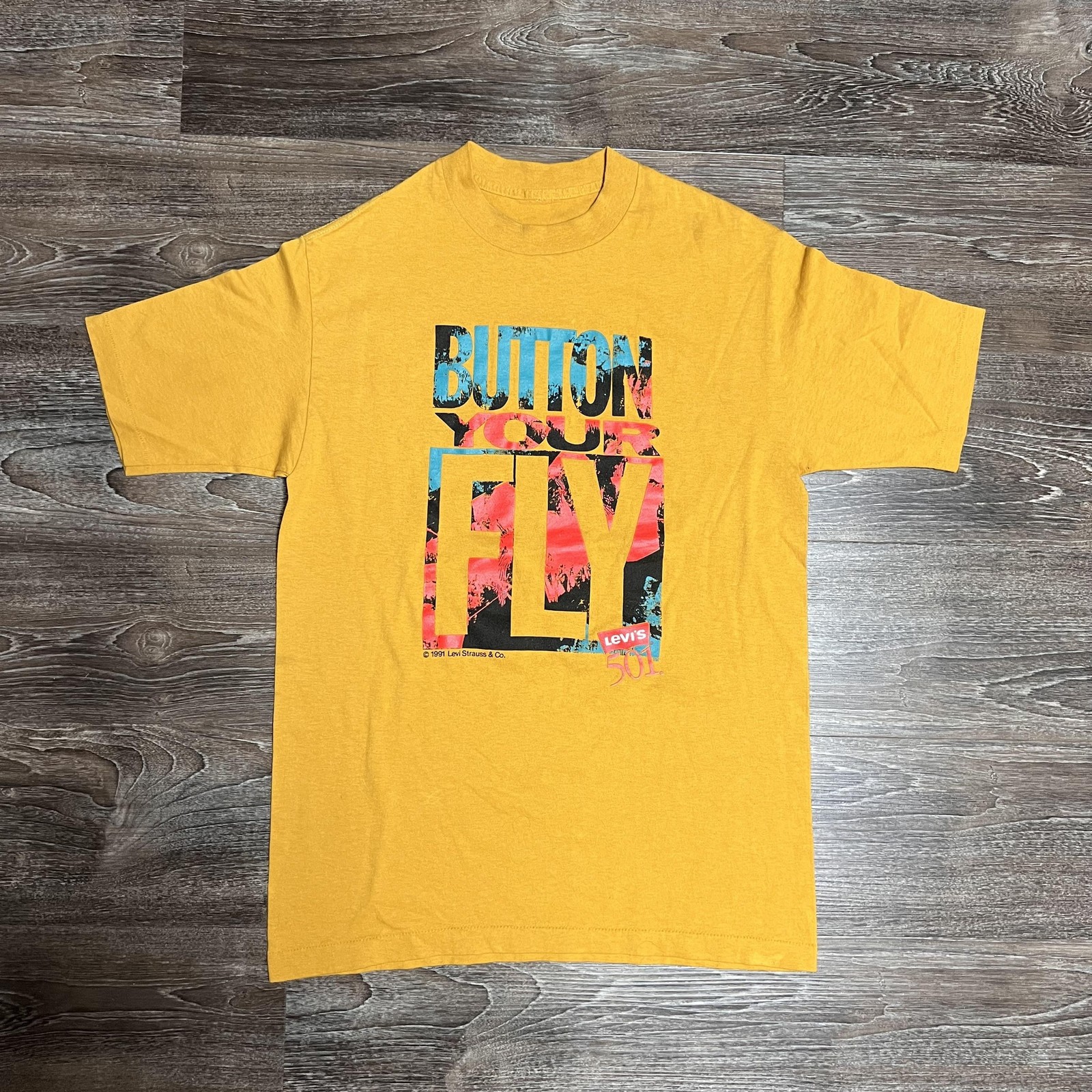 Vintage Levi’s Button Your Fly Shirt Mens Medium Yellow 501 1991 90s Graphic Tee