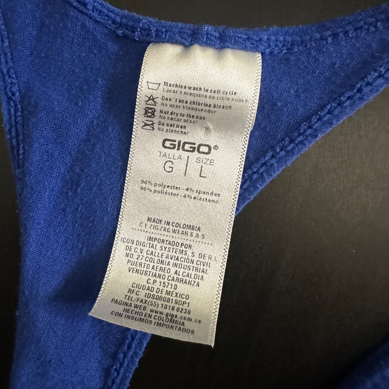 GIGO Stringer Tank Top Large Gently worn 96% polyester/4% spandex 20″ armpits