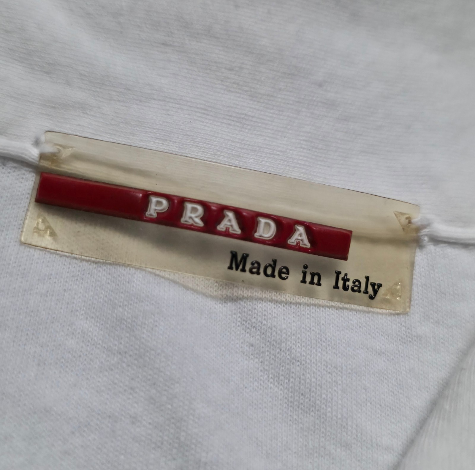 “Prada White LS Stretchable Polo Shirt Red Logo Patch”
