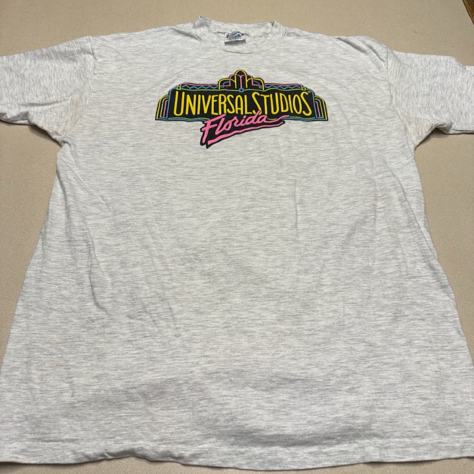 Vintage 90s UNIVERSAL STUDIOS FLORIDA NEON Beefy T-shirt See Pics Spots XXL USA