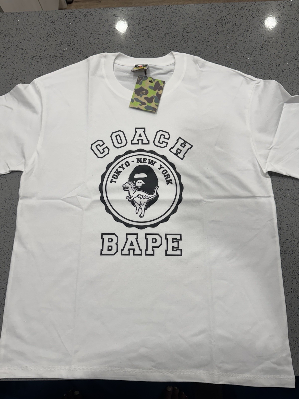 A Bathing Ape x Coach Men’s White Graphic Print Crew Neck Short Sleeve Tee