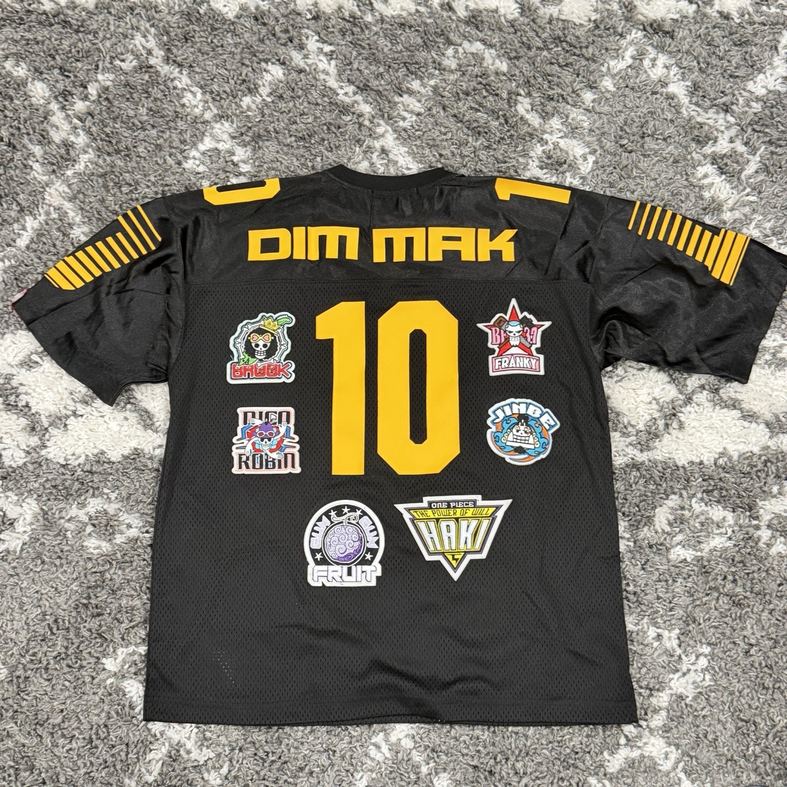 DIM MAK X ONE PIECE – Straw hat crew JERSEY BLACK YELLOW SIZE S