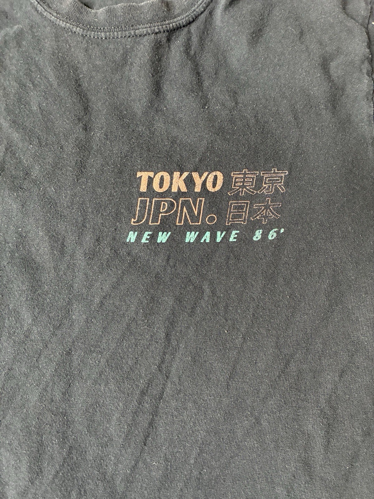 black T-shirt from New Look features a small “Tokyo Japan”