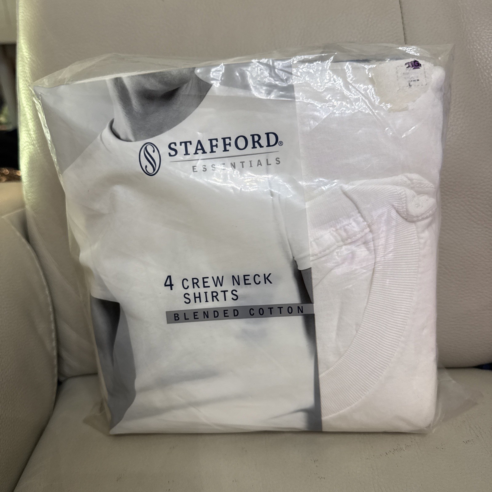 a Stafford Essentials 4-Pack of Men’s Blended Cotton Crew Neck T-Shirts.