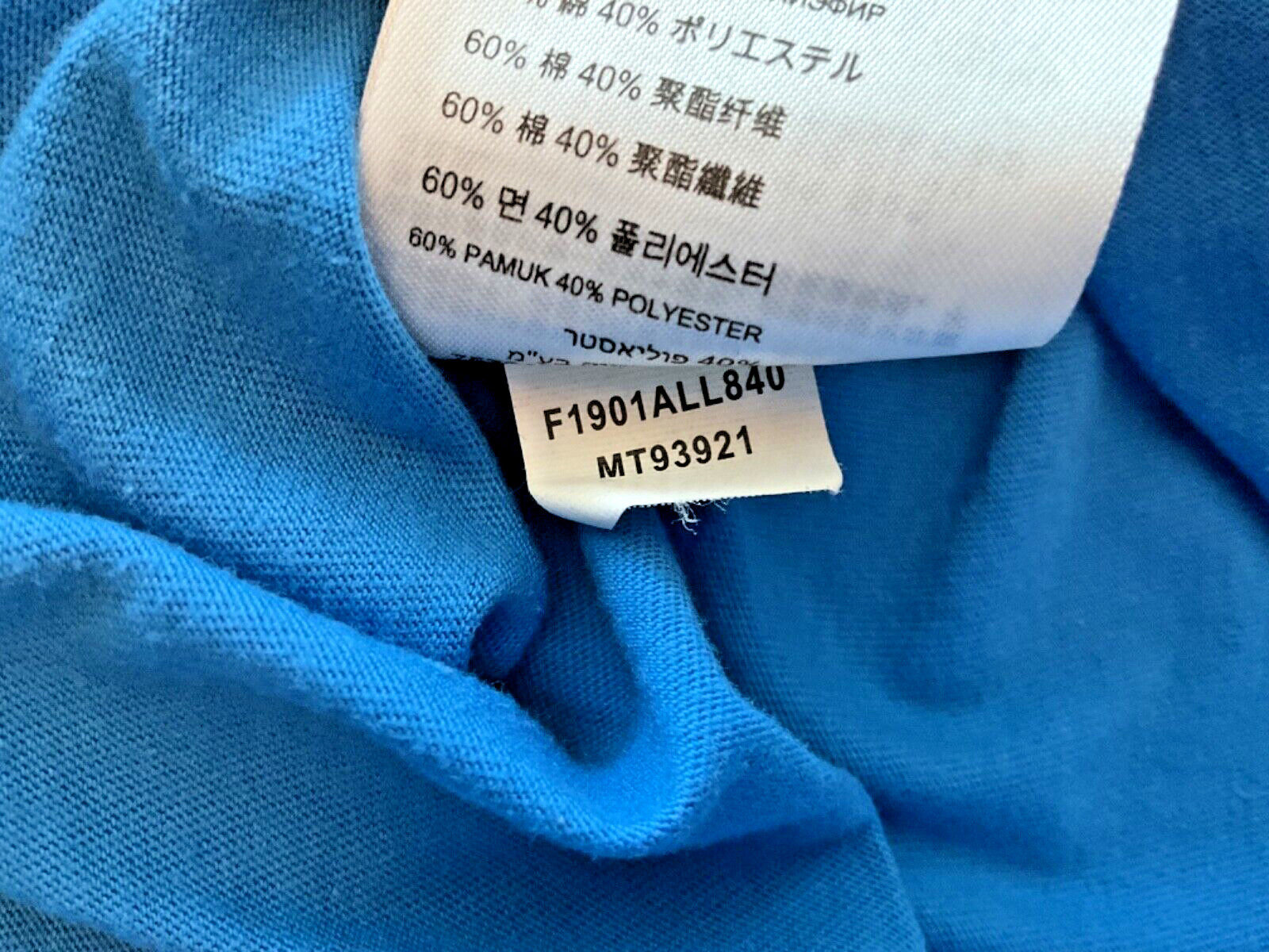 NB New Balance Stretch Blue Pocket T Shirt Unisex size Small Round Slit Hemline