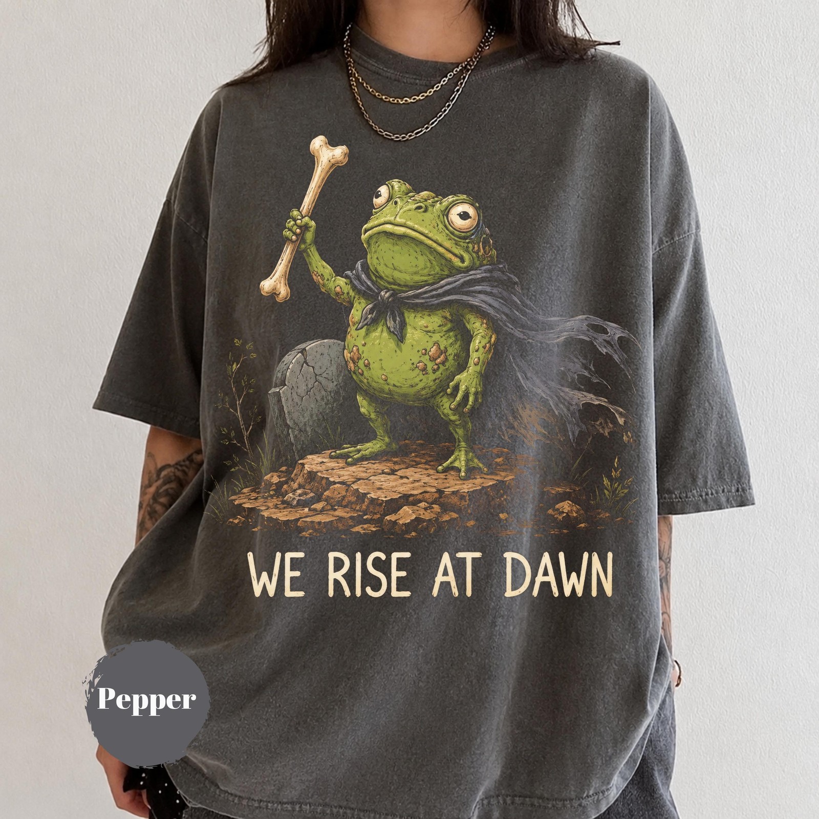 We Rise At Dawn Shirt Zombie Frog Halloween Summerween Funny Graphic Tee