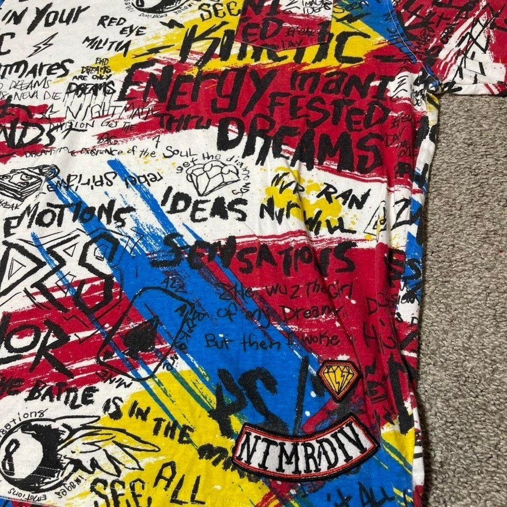 Multicoloured graffiti style graphic tee with bold designs