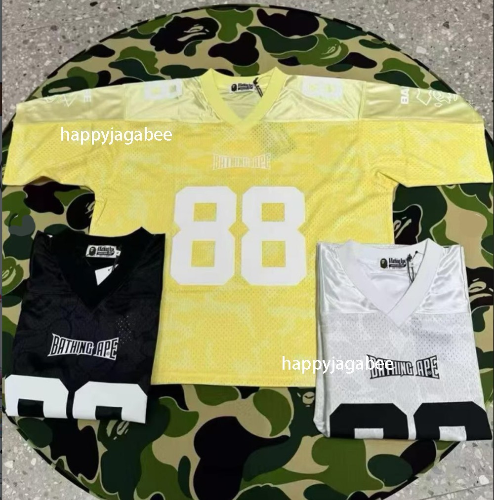 A BATHING APE Men’s SOLID CAMO MULTI LOGO RELAXED FIT FOOTBALL JERSEY TEE rz