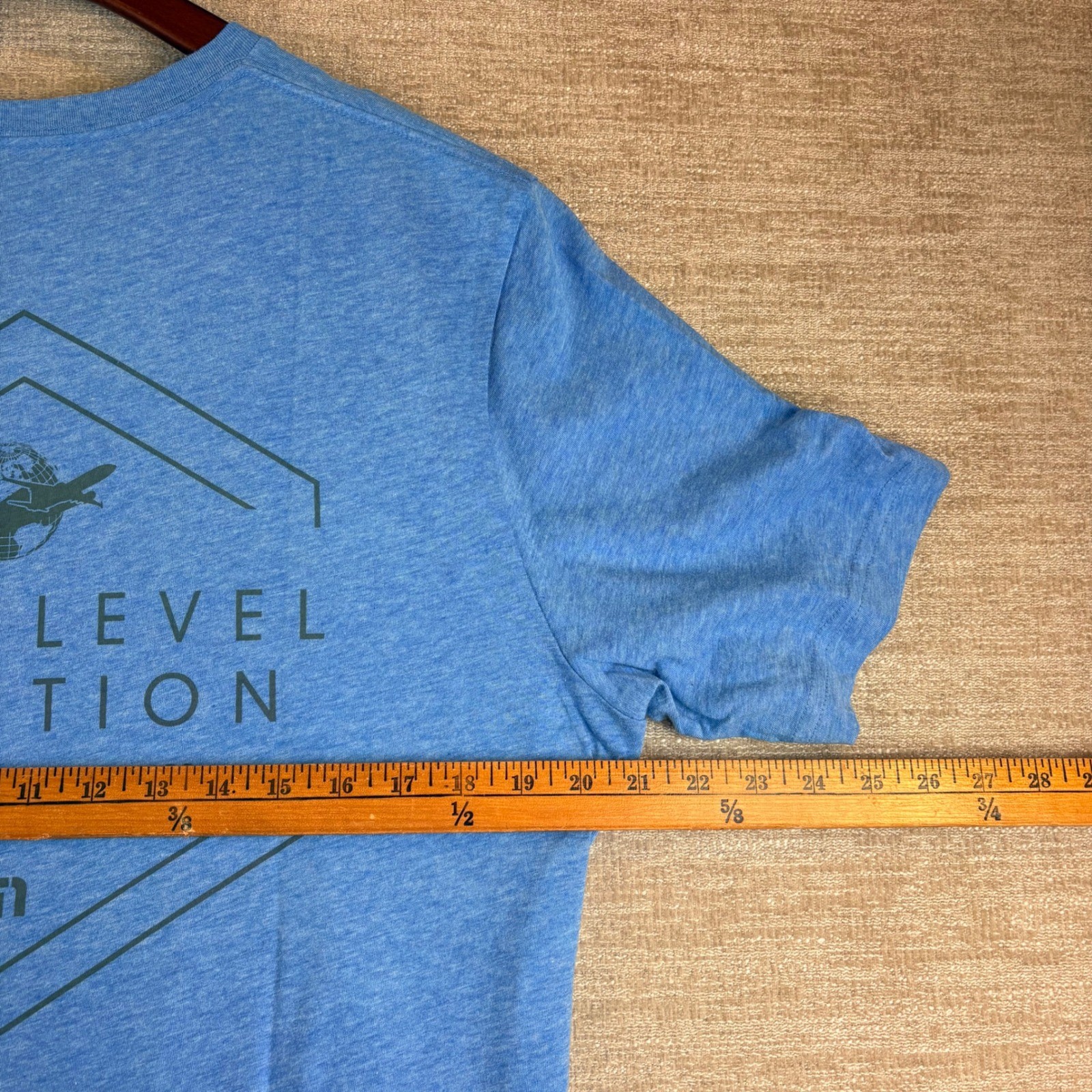 BRAND NEW TravisMathew Heather Blue Next Level Aviation Graphic T-Shirt LG NWT