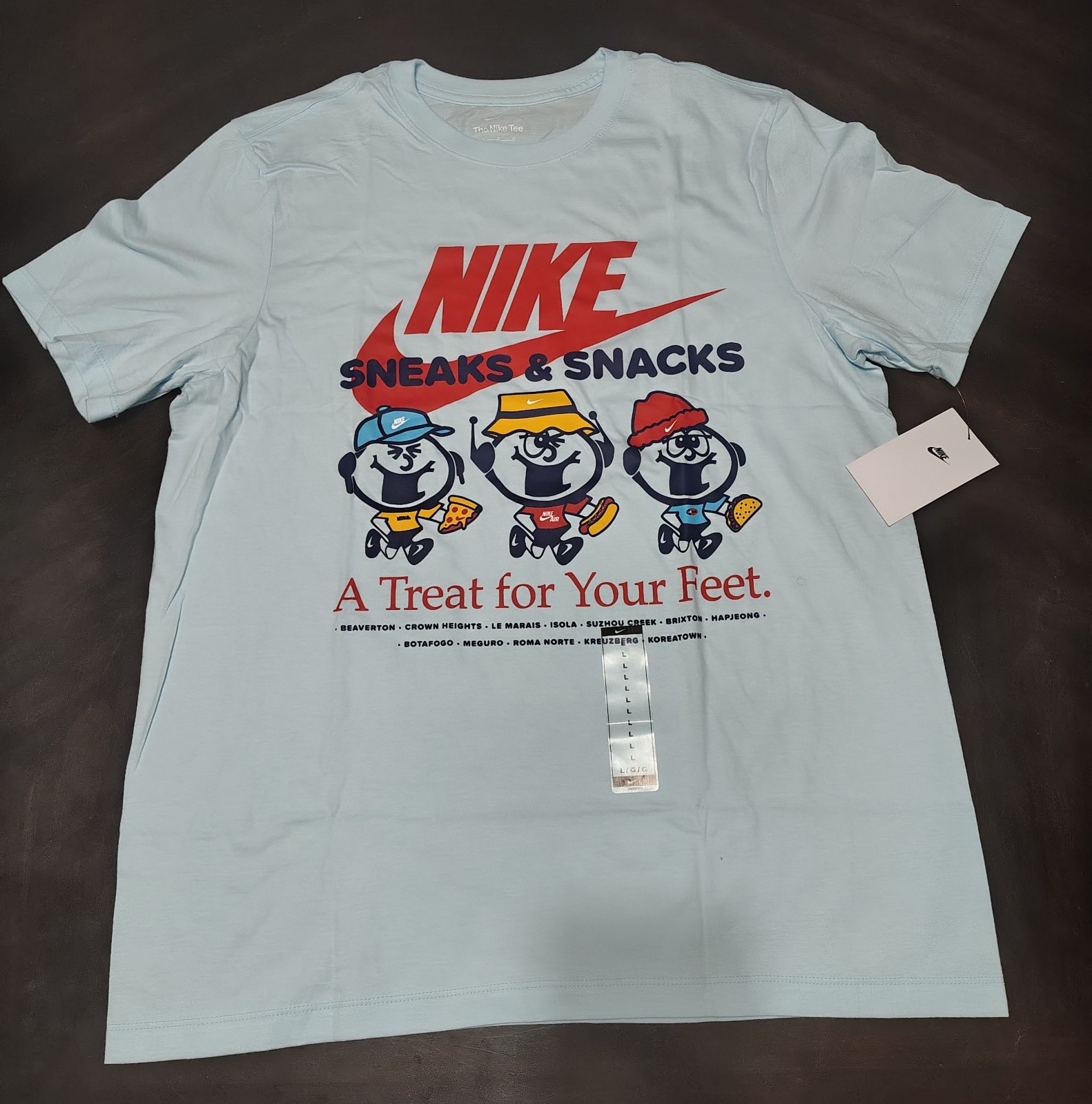 Nike Sportswear Sneaks & Snacks A Treat For Your Feet Graphic Tee Sky-blue
